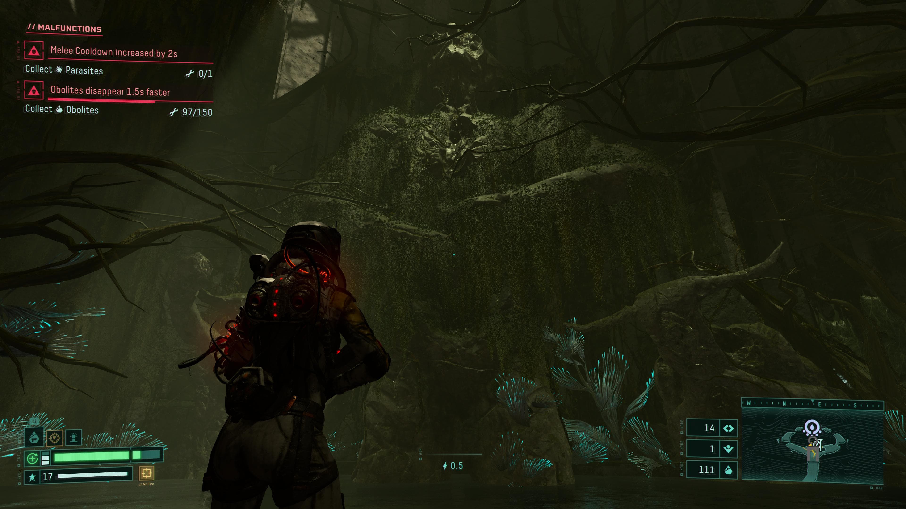 Selene gazing up to a statue above the pit.