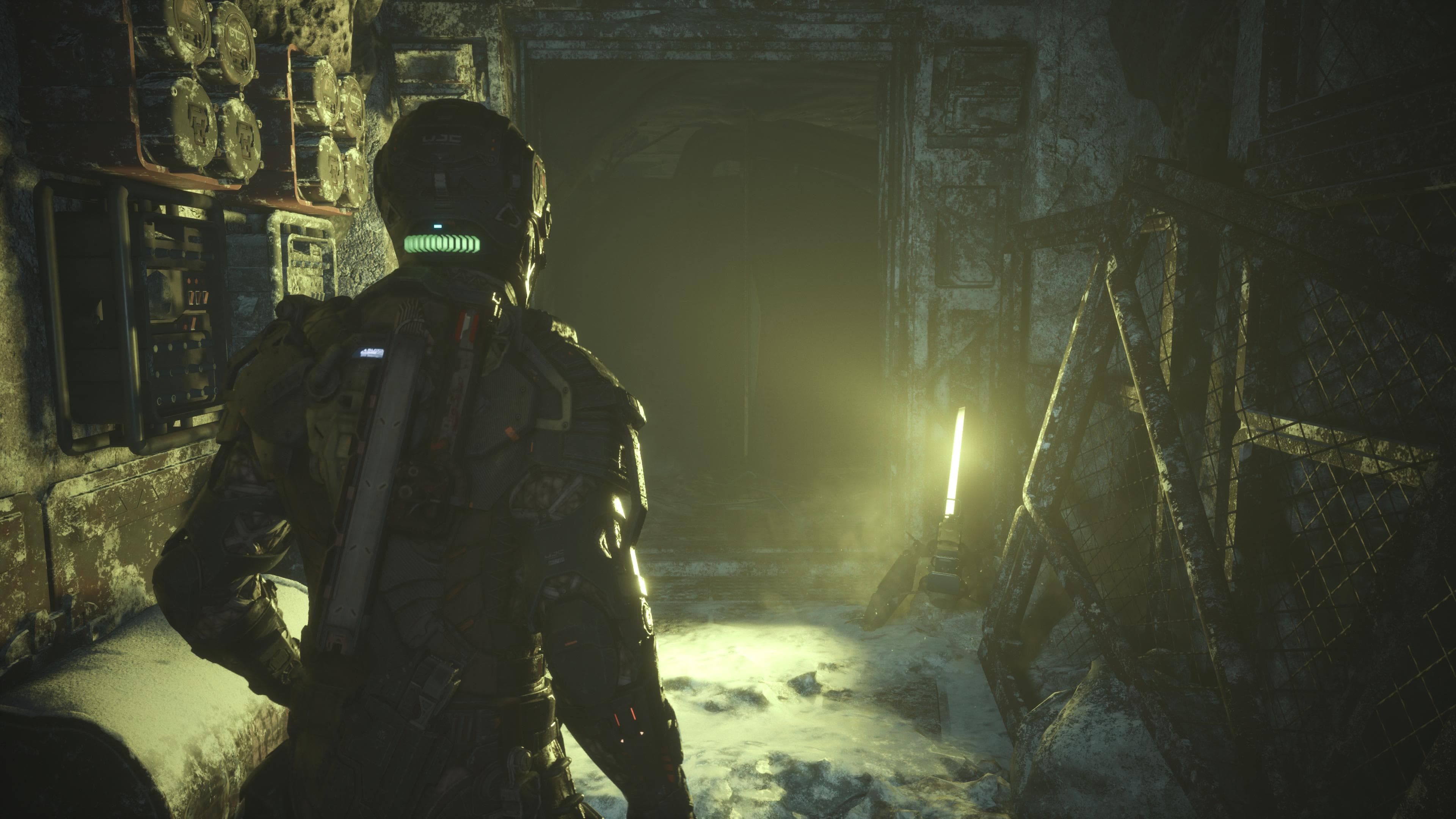 Jacob walks down a dimly lit snowy hallway