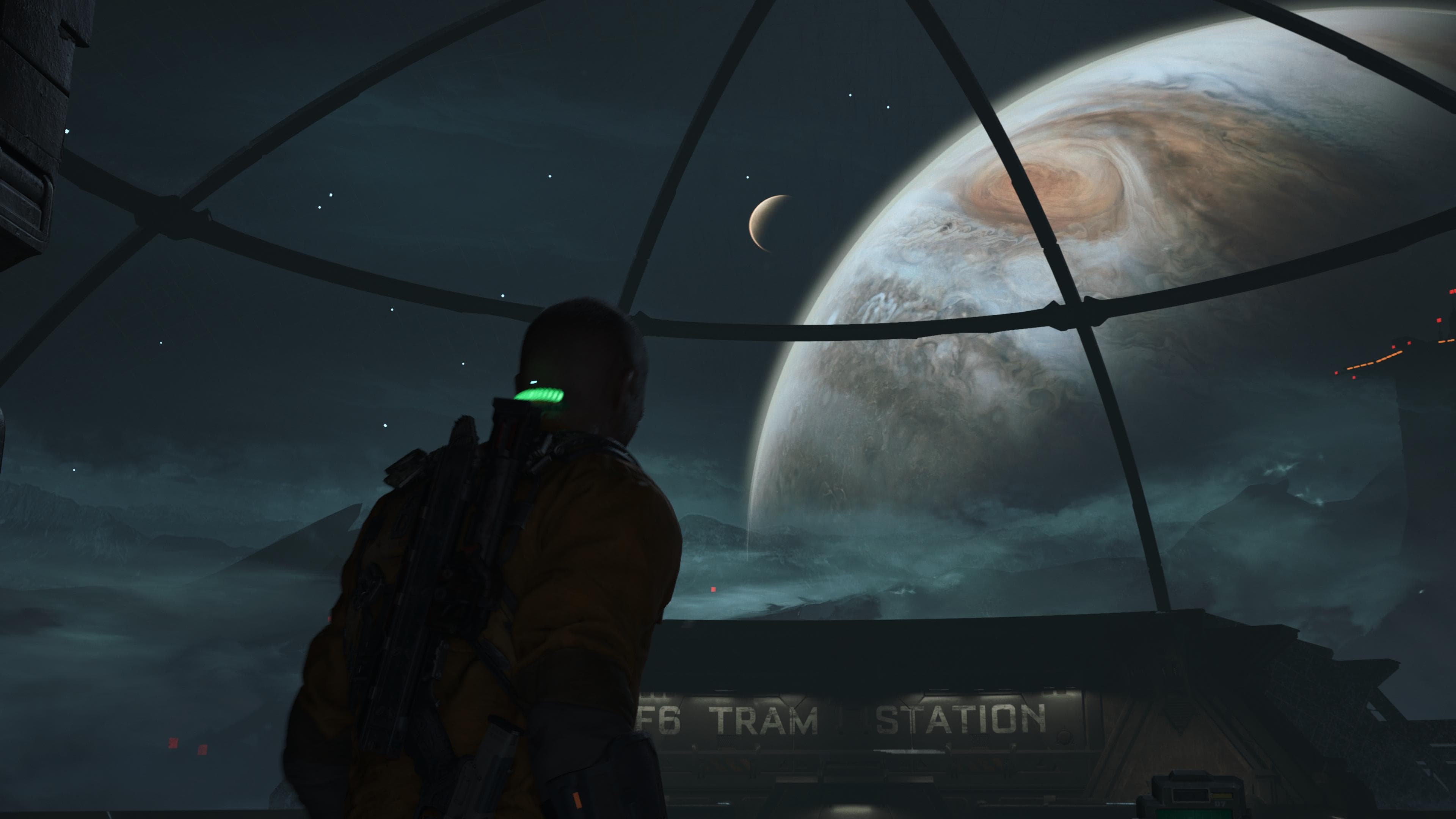 Jacob looks out the observatory toward Jupiter and another moon